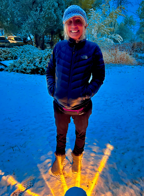 happy woman outside in the snow